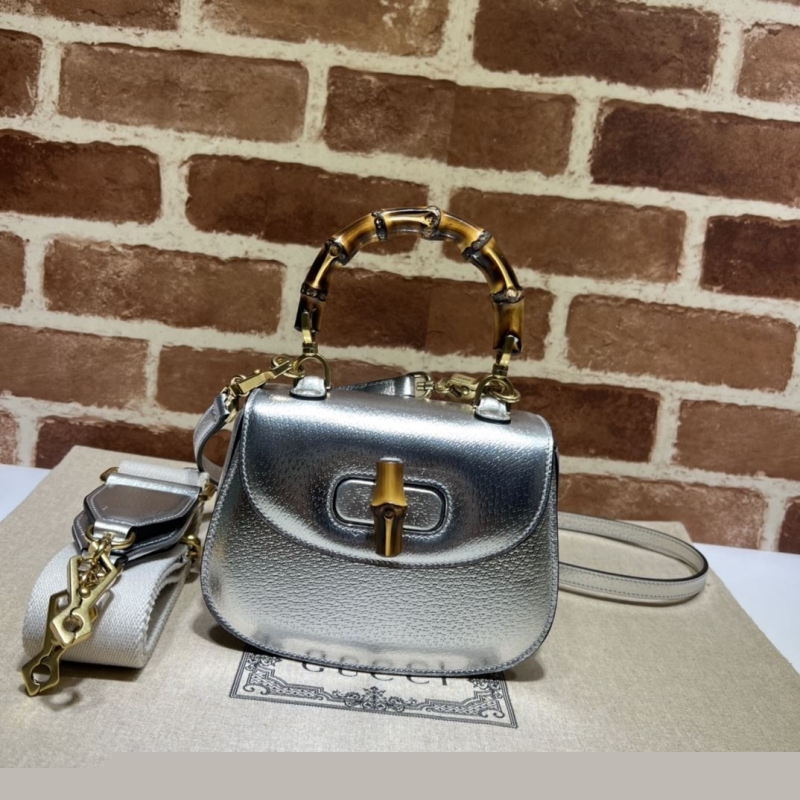 G*u*i top handle bags